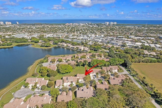 aerial view featuring a water view and a residential view