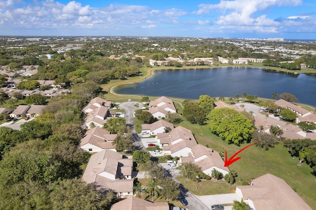 birds eye view of property featuring a residential view and a water view