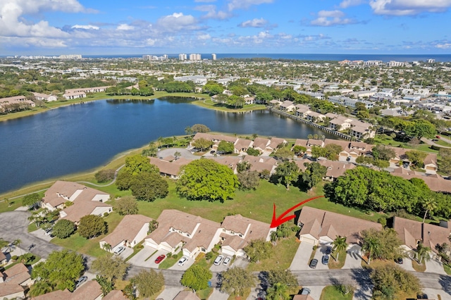 aerial view featuring a water view and a residential view