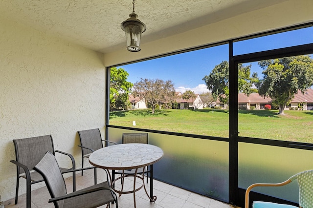 sunroom with a residential view