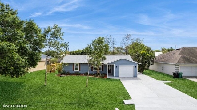 ranch-style house with a garage, driveway, and a front lawn