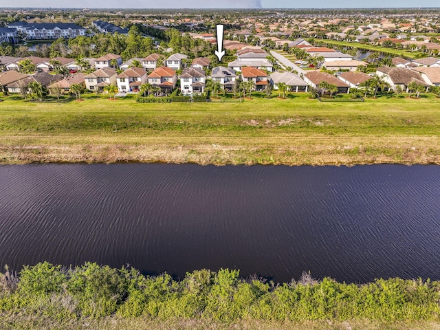 800 SE Villandry Way, Port Saint Lucie, FL 34984 - aerial perspective of suburban area featuring a nearby body of water