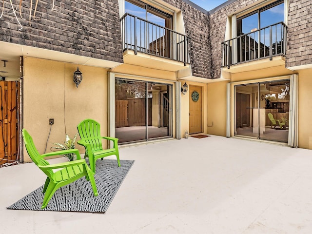 view of patio / terrace featuring a balcony