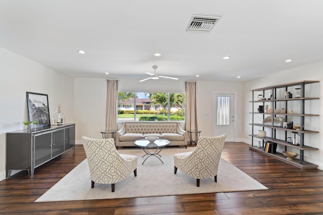 sitting room with recessed lighting, wood-type flooring, visible vents, a ceiling fan, and baseboards