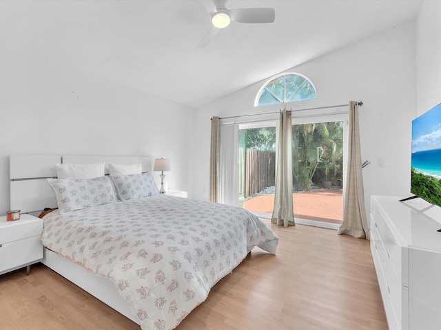 bedroom featuring a ceiling fan, access to outside, vaulted ceiling, and light wood-style flooring