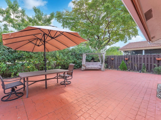 view of patio / terrace with fence and outdoor dining area