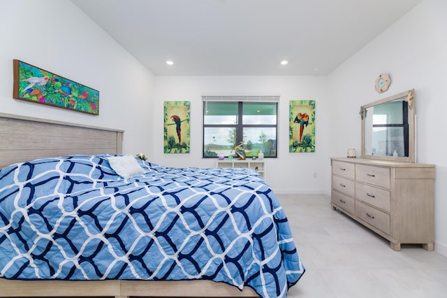 bedroom featuring baseboards and recessed lighting