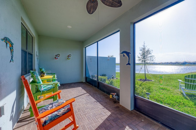 sunroom with a water view