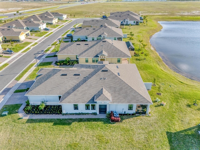 aerial view featuring a water view and a residential view