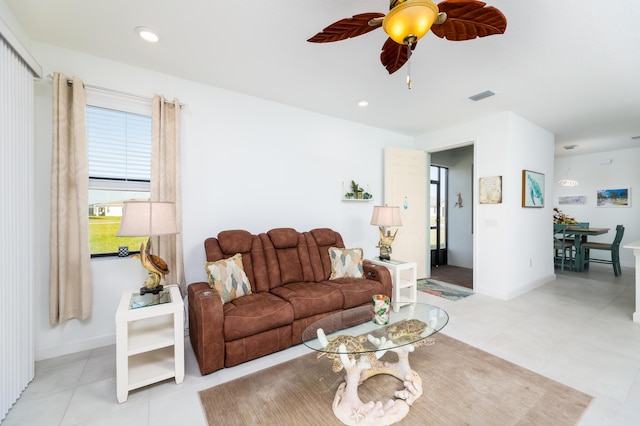 living room featuring recessed lighting, visible vents, ceiling fan, and baseboards