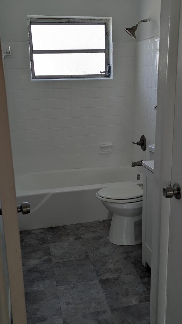 full bathroom with toilet, bathing tub / shower combination, and vanity