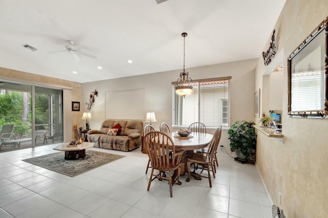 dining room with a ceiling fan, recessed lighting, and visible vents