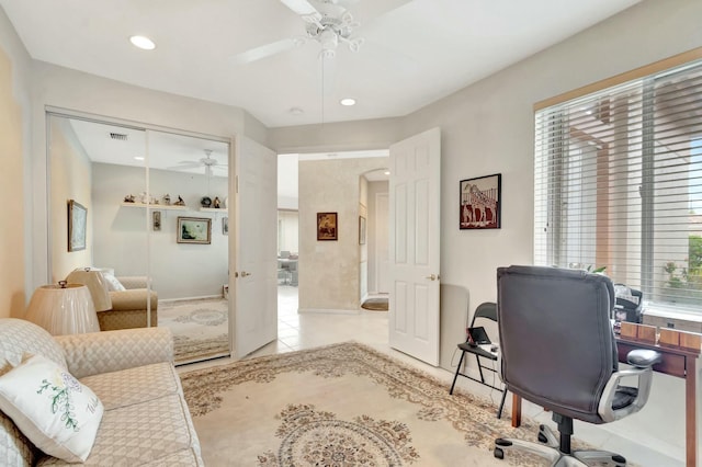 home office with visible vents, arched walkways, a ceiling fan, tile patterned floors, and recessed lighting