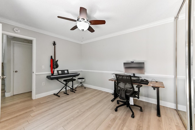 home office featuring ornamental molding, a ceiling fan, baseboards, and wood finished floors