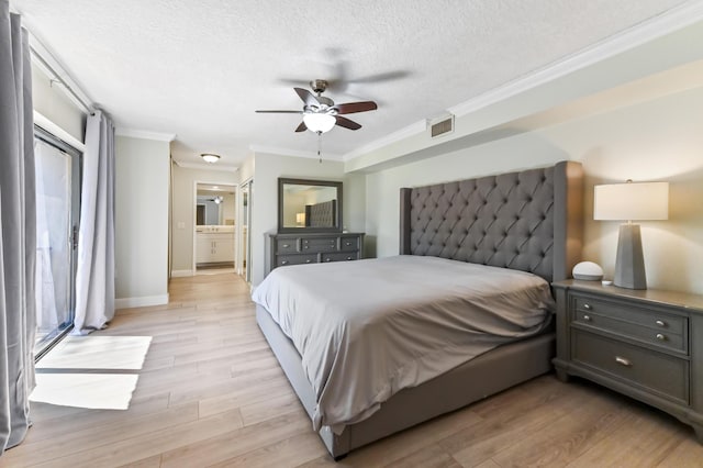 bedroom with visible vents, crown molding, and light wood-type flooring