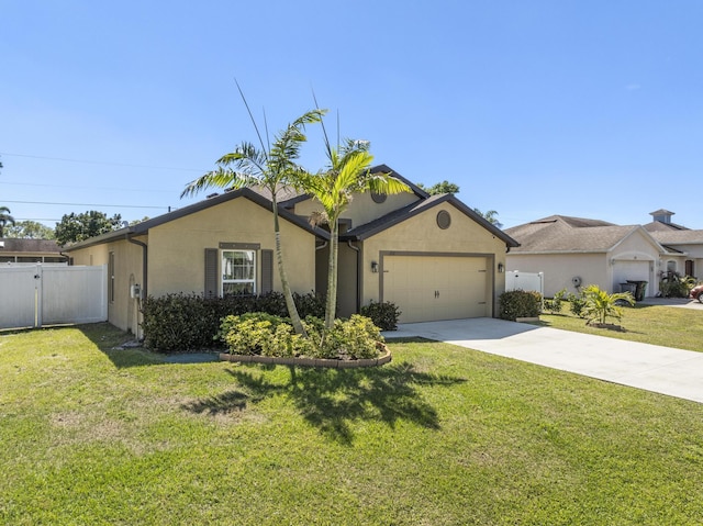 single story home with stucco siding, an attached garage, concrete driveway, and a front yard