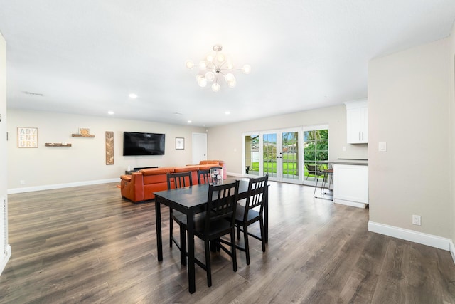 dining space with baseboards, a chandelier, dark wood-type flooring, and recessed lighting