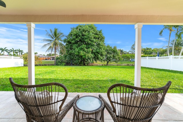 view of patio / terrace featuring fence