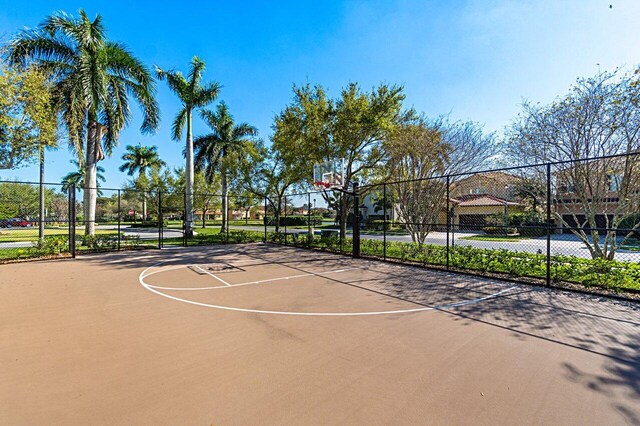 view of sport court with community basketball court and fence