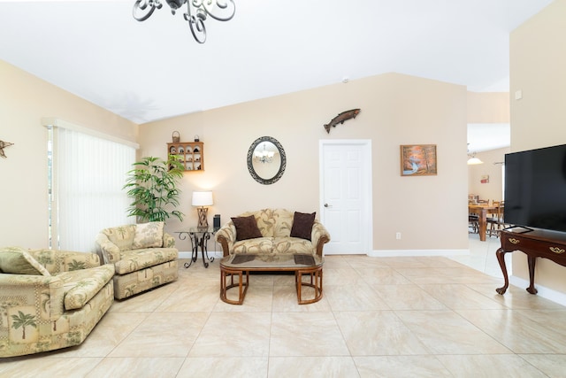 living room with light tile patterned flooring, baseboards, and vaulted ceiling