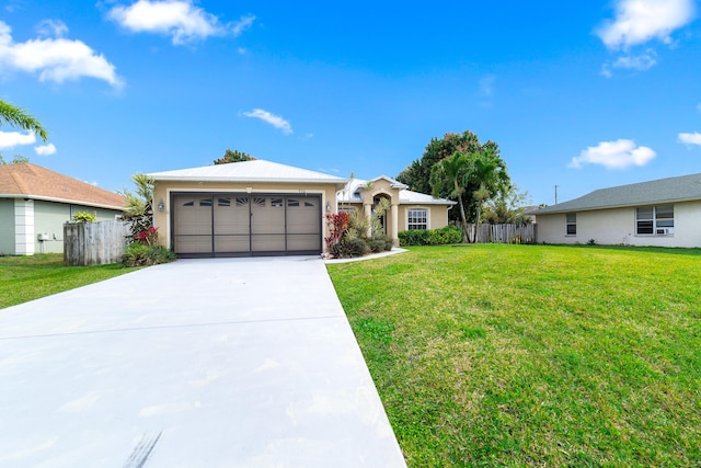 single story home featuring a front lawn, fence, concrete driveway, stucco siding, and a garage