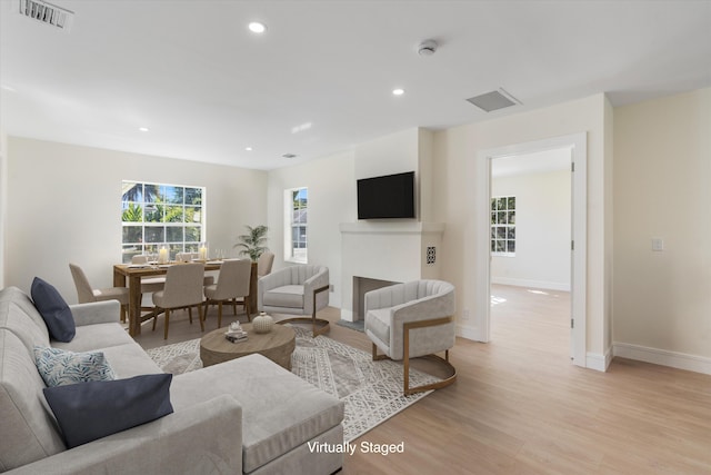 108 NW 4th Ave, Delray Beach, FL 33444 - living area featuring light wood-style flooring, baseboards, and recessed lighting