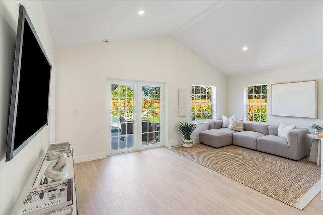 living area with wood finished floors, baseboards, vaulted ceiling, and recessed lighting
