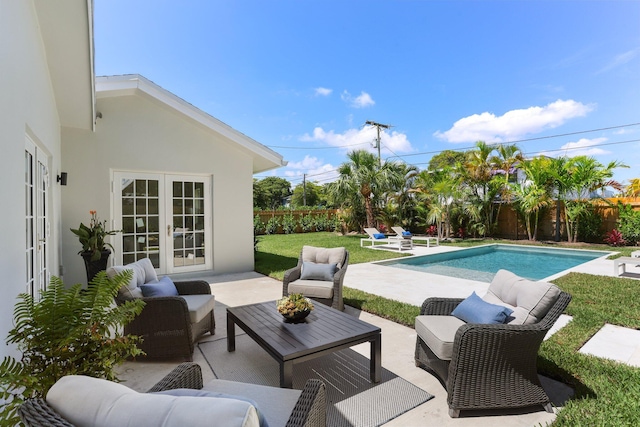 108 NW 4th Ave, Delray Beach, FL 33444 - view of swimming pool featuring french doors, an outdoor living space, and a patio