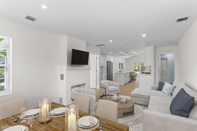 108 NW 4th Ave, Delray Beach, FL 33444 - living area featuring light wood-style flooring and recessed lighting