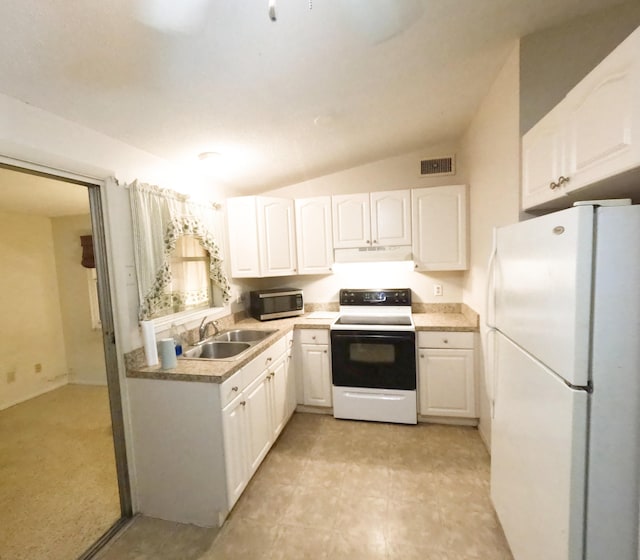 kitchen featuring lofted ceiling, under cabinet range hood, white appliances, a sink, and white cabinetry