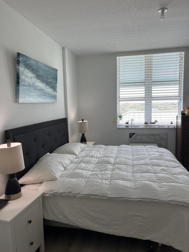 bedroom with a textured ceiling