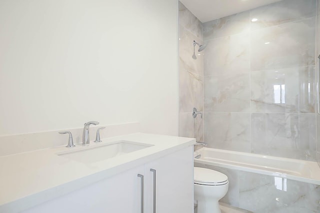 bathroom featuring vanity,  shower combination, and toilet