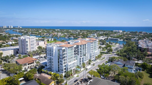 birds eye view of property featuring a water view