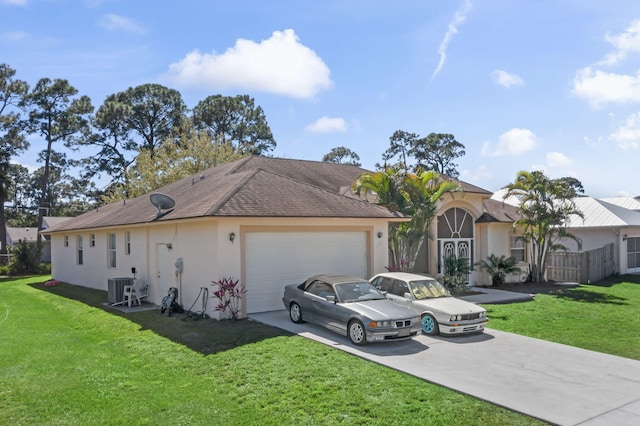 ranch-style house with concrete driveway, a front yard, central AC, and stucco siding