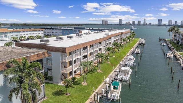 aerial view with a water view and a city view