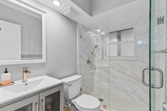 full bath featuring visible vents, a stall shower, vanity, and toilet