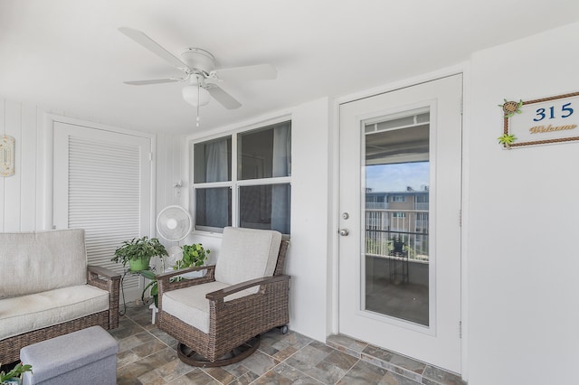 view of patio featuring a ceiling fan