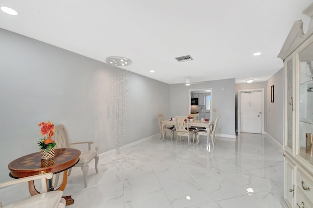 dining room with marble finish floor, recessed lighting, visible vents, a ceiling fan, and baseboards