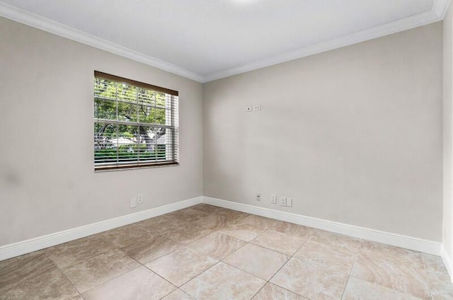 unfurnished room featuring baseboards and ornamental molding