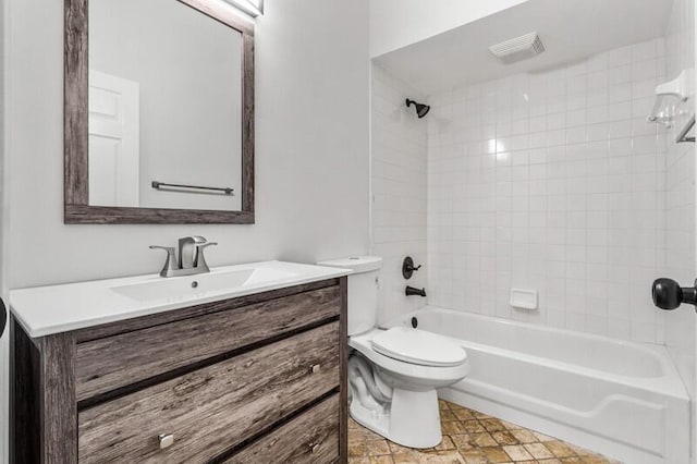 full bathroom with visible vents, toilet, vanity, and  shower combination