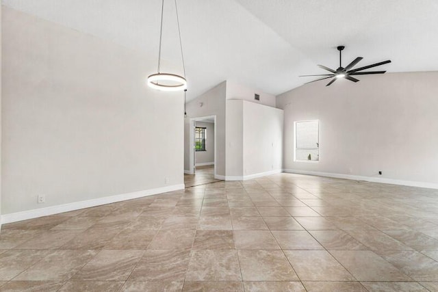 unfurnished room featuring light tile patterned floors, baseboards, ceiling fan, and vaulted ceiling