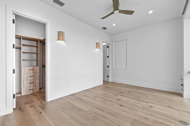 unfurnished bedroom with light wood-style flooring, recessed lighting, visible vents, and baseboards