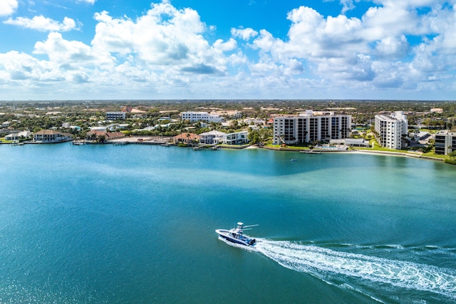 aerial view featuring a water view and a city view