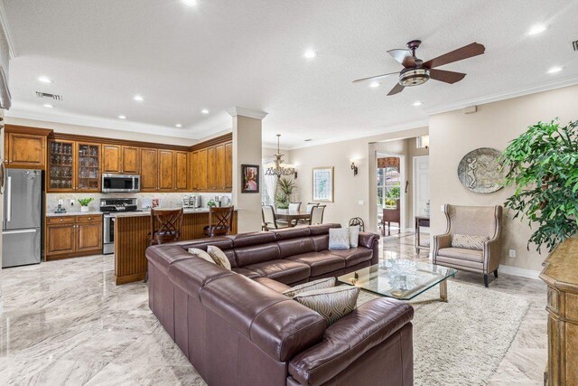 living area with visible vents, marble finish floor, recessed lighting, crown molding, and baseboards