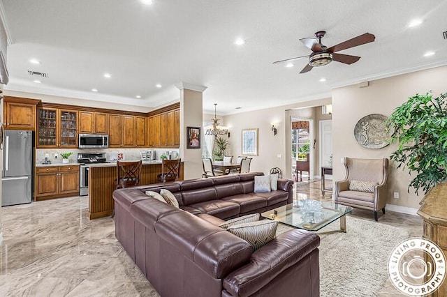 living room with recessed lighting, visible vents, marble finish floor, and crown molding