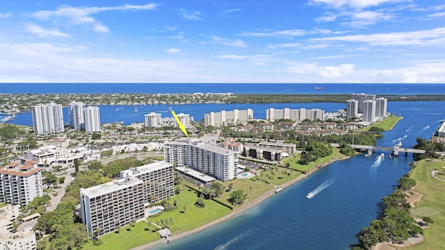 drone / aerial view with a water view and a city view