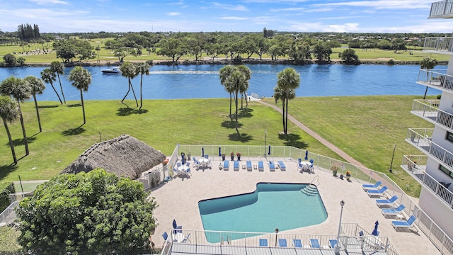 birds eye view of property featuring a water view