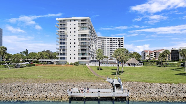 view of dock with a yard