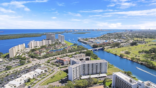 aerial view featuring a view of city and a water view