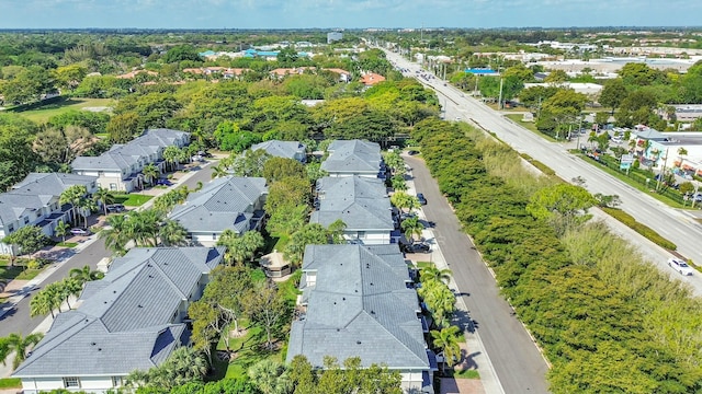 birds eye view of property with a residential view